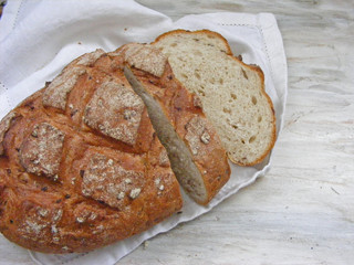 slices of bread on a white napkin on wooden background