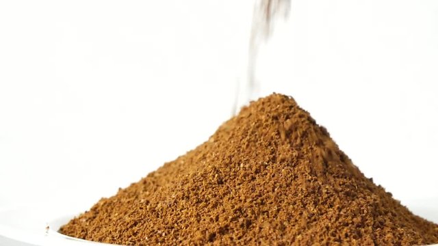 Natural ground coffee. Heap of fine grinding coffee powder