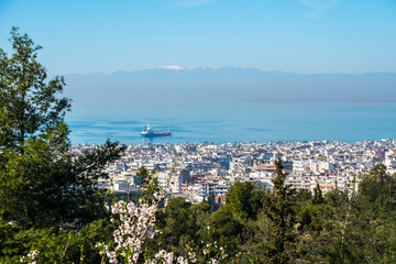 Fototapeta na wymiar Ship in the gulf of Thessaloniki, Greece, on a sunny sky