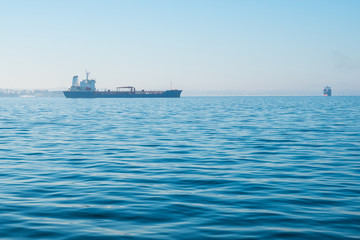 Ship in the gulf of Thessaloniki, Greece, on a sunny sky