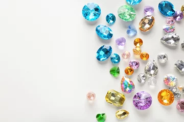 Fototapeten Colorful precious stones for jewellery on white background © Africa Studio