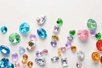 Colorful precious stones for jewellery on white background