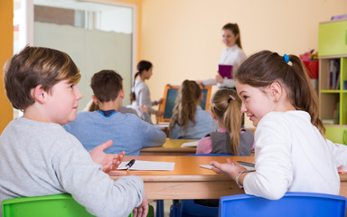 Fototapeta na wymiar Children discussing during lesson
