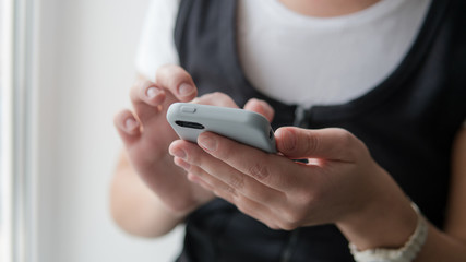 Telephone in  womans hands