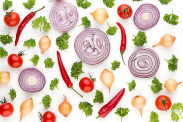 Onion and spices isolated on white background, top view. Wallpaper abstract composition of vegetables.