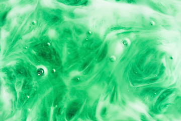 green background on the basis of a combination of lumps, macro abstract