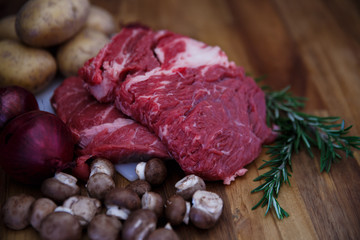 Fresh meat with vegetables, mushrooms, onion potatoes