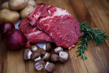 Fresh meat with vegetables, mushrooms, onion potatoes