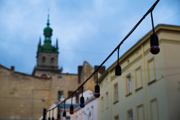 Fototapeta na wymiar tower of old church above european city