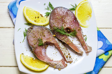 steaks of raw fish