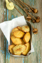 Homemade Madeleine cookies with poppy seeds and lemon zest.