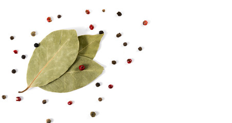 bay leaves and seasonings on a white background