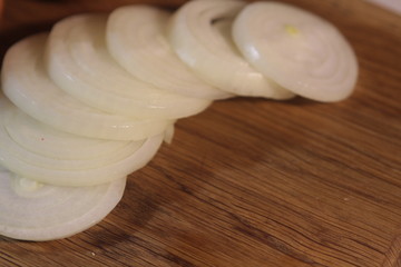 Fototapeta na wymiar onion on wooden board