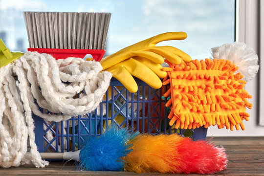 Close up products for cleaning. Basket full of cleaning equipment. Big spring cleaning.