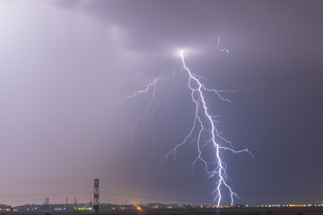 Lightning flash over a city lectricity blast storm