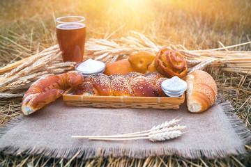 Fresh bread and a drink, bakery products closeup