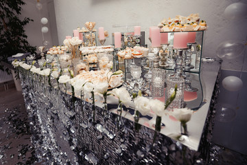 Candy Bar. Delicious sweet buffet with cupcakes. Sweet holiday b