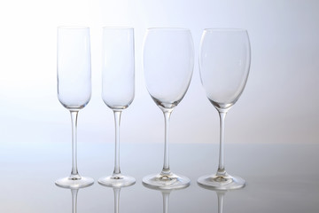 four. empty wine glass on a light background