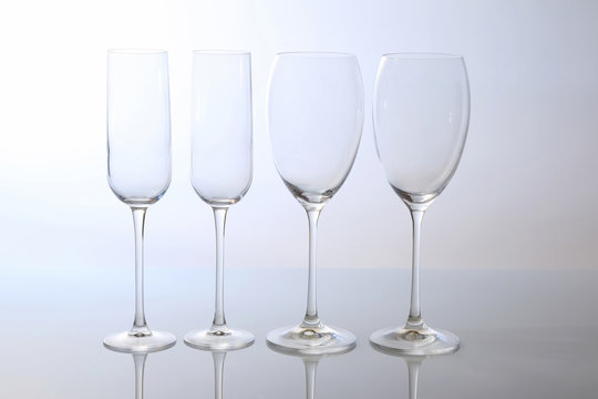 four. empty wine glass on a light background