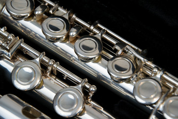 Naklejka premium Close up of the silver plated musical instrument flute