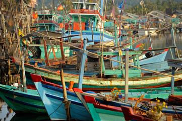 Fototapeta na wymiar Fishing boats in picturesque harbor.