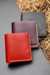 Set of three red brown and black wallet. Hand made leather man wallet . Multi colored. Leather...