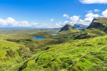 Fototapeta na wymiar View of Quiraing mountains in a sunny day, Isle of Skye, Scotland, Britain