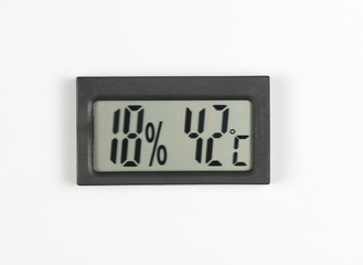 electronic humidity meter and temperature on white background