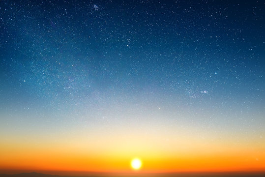 sunrise in morning sky with star and milky way background