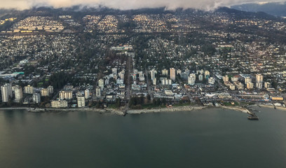 Naklejka premium Birdseye City and Ocean Aerial View from Seaplane