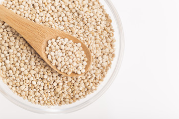 Quinoa grains in bowl isolated on white background, Chenopodium quinoa