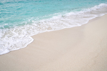 Fototapeta na wymiar Beach and sand with water wave. Nature background.