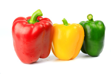 Red Chili Peppers, Yellow Chili Peppers,Green Chili Peppers, on a white background isolated with clipping path Vegetables make a colorful meal.