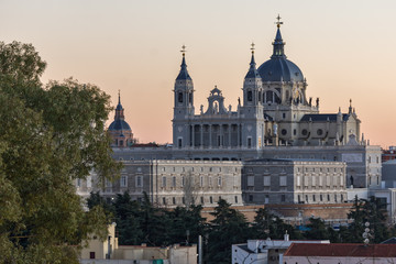 Fototapeta na wymiar Sunset view of Royal Palace and Almudena Cathedral in City of Madrid, Spain