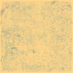 Vintage yellow grunge texture. Background pattern of scuffs and cracks