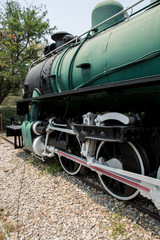 Fototapeta na wymiar Vintage Steam engine locomotive train
