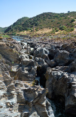 Pulo do Lobo (Wolf's leap) waterfall and cascade of river Guadiana, Alentejo, Portugal