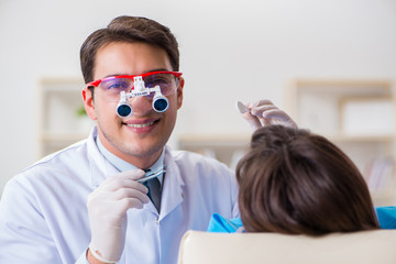 Patient visiting dentist for regular check-up and filling