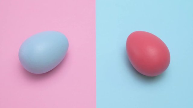 red and blue eggs rotating on the patchy pastel