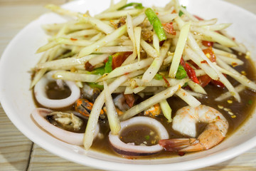 Thai Spicy papaya salad with seafood, Famous Thai food, 