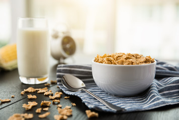Healthy Corn Flakes with milk for Breakfast on table