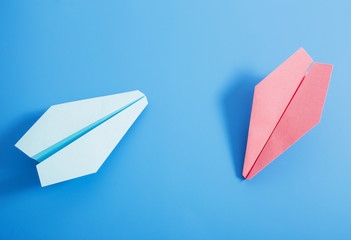 paper plane on blue color background