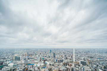 Naklejka premium Asia business concept for real estate and corporate construction - panoramic modern city skyline aerial view of Ikebukuro and expressway in tokyo, Japan