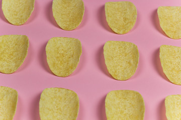 top view chips pattern pink pastel background