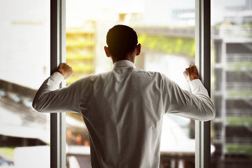 Fototapeta premium Businessman looking out