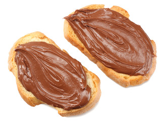 Slice of bread with chocolate cream isolated on white background