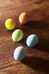 color eggs on wood