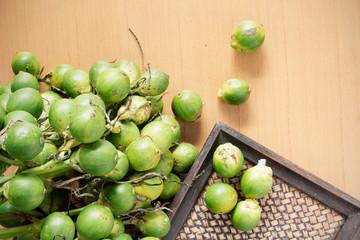 betel nut on table.