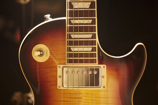 Photo of electric guitar with classic traditional form