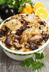 Chicken thigh baked with rice, eggplant and figs